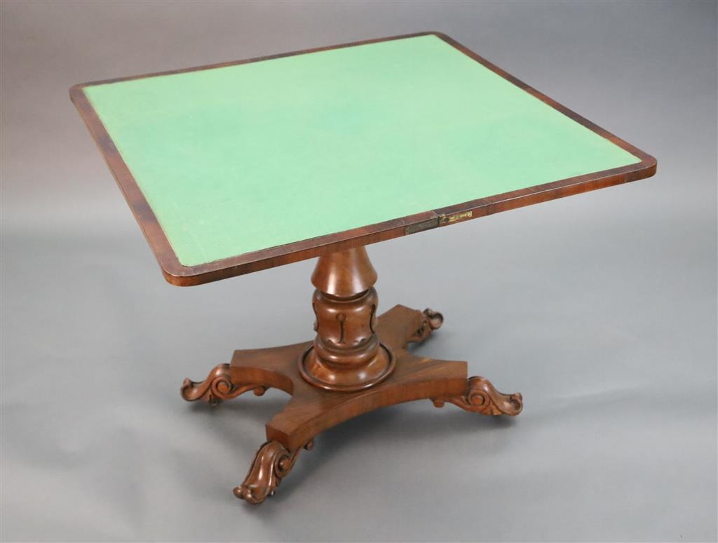 A William IV faded rosewood folding card table,